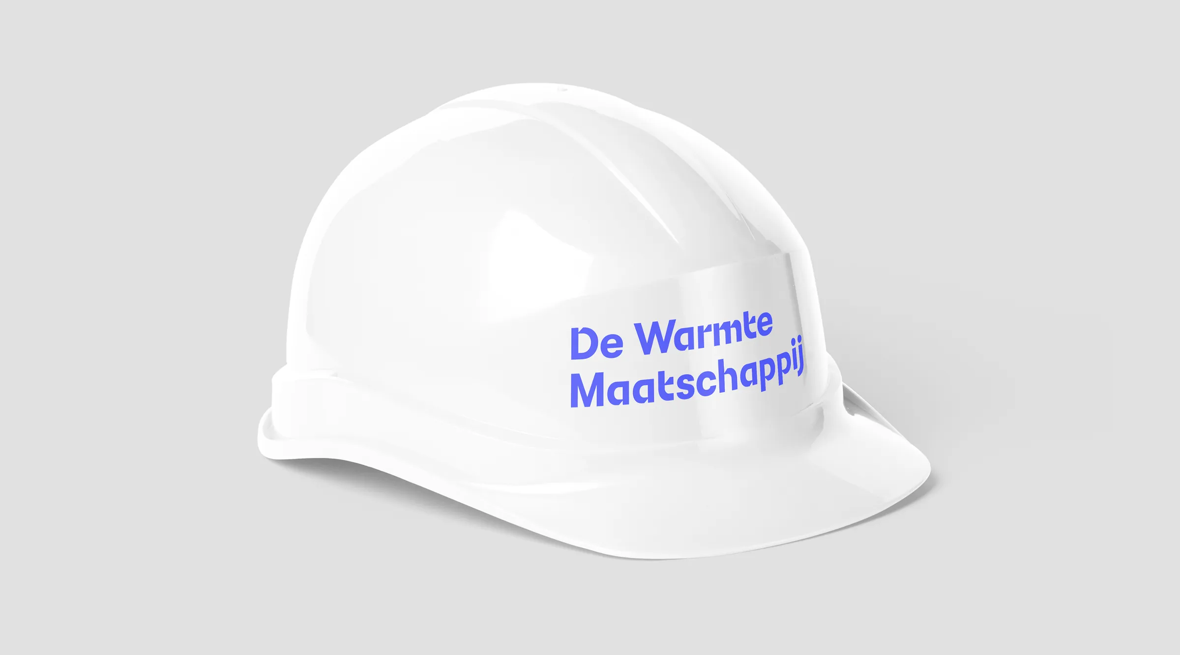DWM brand application across physical touchpoints.